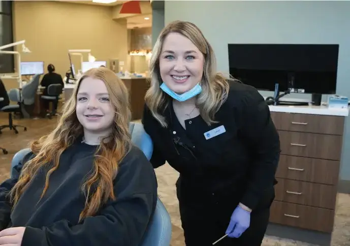 girl and female orthodontist