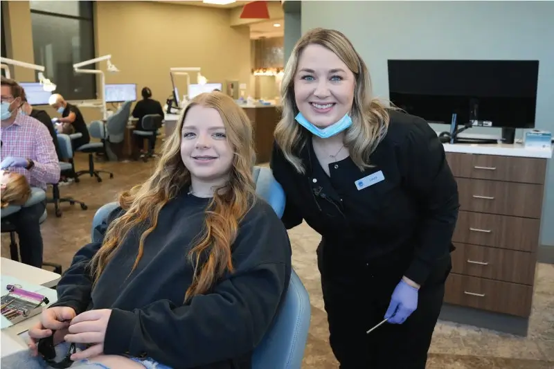 girl and female orthodontist