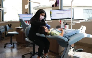 woman dentist and patient